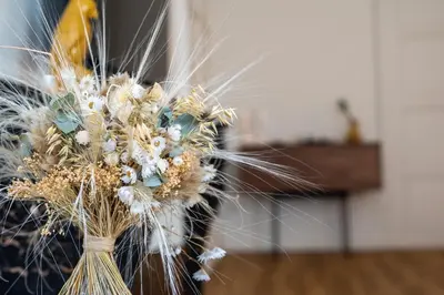 a bouquet of dried flowers in a vase at Le Belem in Carcassonne