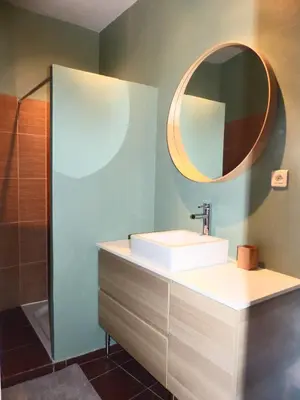 a bathroom with a sink and a mirror at Le tout cosy - Wifi - Disney - EvasionPamiers in Pamiers