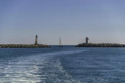 a large body of water with two islands in the distance at Les Ilots de Gruissan in Gruissan