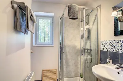 a bathroom with a shower and a sink at Gîte - Holiday Home Vent Marin in Limoux