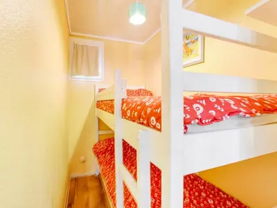 a small room with two bunk beds in it at Apartment Les Portes de la Plage by Interhome in Gruissan