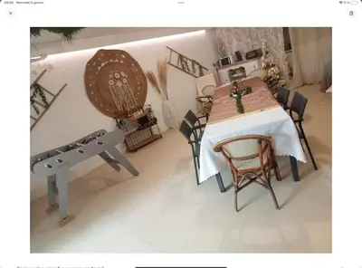 a dining room with a table and chairs at La Villa Du Menhir Chambre d'hôtes in Bize-Minervois