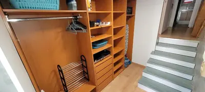 a closet with a staircase in a house at Maison 3 pièces 5-7pers Vue sur port, garage, clim in Gruissan