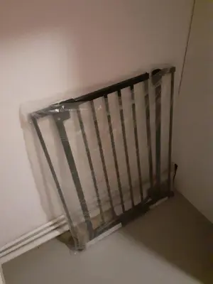 a metal railing on the side of a wall at Gîte du Gua des Brasses au bord du lac de la Raviège in La Salvetat
