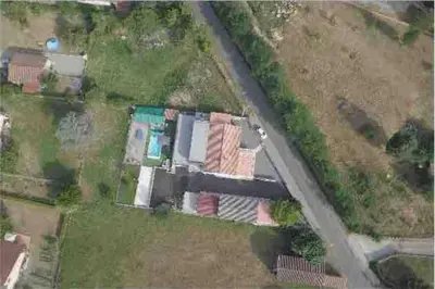 an aerial view of a house with a yard at Koh Samet Siam Manahakhon Appart & Spa in Rieux-de-Pelleport