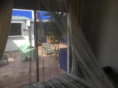 a view of a patio from a room with a window at Casa Léon in Narbonne