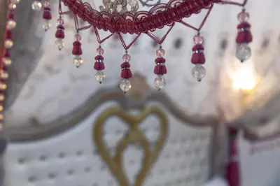 a close up of a necklace with a heart at Studio Romantique Maison de L'église du Couvent in Narbonne