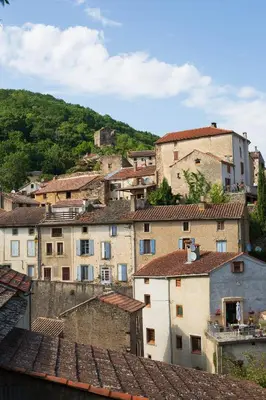 a view of a town from the roofs of houses at Gîte Roc Suzadou in Ferrals-les-Montagnes