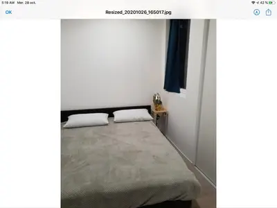 a bedroom with a bed in a room at Appartement Plein centre in Narbonne