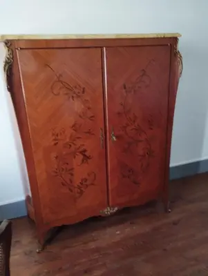 a wooden cabinet with a white counter top at MAISON ALBA LA SOURCE in Mazamet