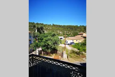 a view from a balcony of a small town at Maison au milieu des vignes in Aigues-Vives