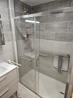 a shower with a glass door in a bathroom at Serge Le Belge - Sejour authentique chez l habitant a Lezignan Corbieres in Lézignan-Corbières