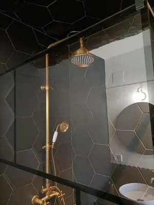 a bathroom with a shower and a sink at L’UNDERGROUND Studio Hyper-Centre in Carcassonne