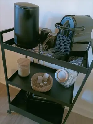 a shelf with a pot and medicines on it at L’UNDERGROUND Studio Hyper-Centre in Carcassonne