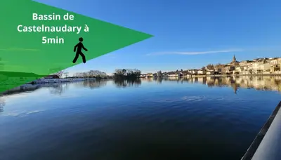 a picture of a river with a person jumping into the water at La Pause Laurag-aise l'embleur Oc Keys 27 in Castelnaudary