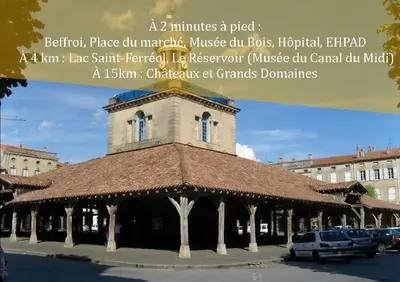 a building with a clock tower on top of it at Appartement 