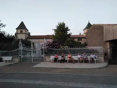 a bunch of cars parked in a parking lot at Maison DELMAS, l'Oustal du Recantu in Sainte-Eulalie