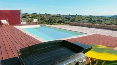 a swimming pool on top of a roof at Maison avec vue sur la mer et avec piscine à Fitou in Fitou