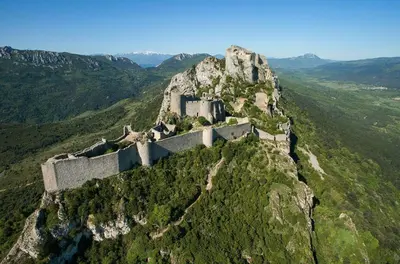 a castle on the top of a mountain at Domaine Les Cascades in Ribaute
