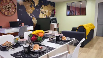a kitchen with a sink and a refrigerator at LE CONCORDE-WIFI-Clim-Parking-3étoiles-OcKeys in Bram