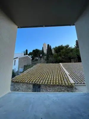 a view of a tile roof of a building at La maison Barberousse in Gruissan