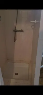 a shower in a bathroom with a shower at Studio meublé Viane in Viane