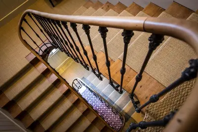 an overhead view of a stairway with a railing at Carcassonne Bed and Breakfast du Palais in Carcassonne