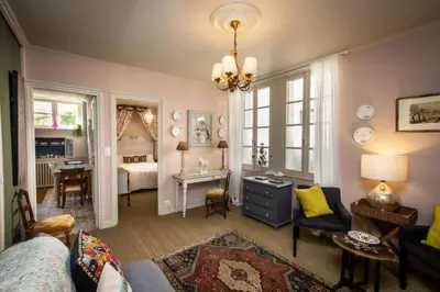 a living room with a couch and a table at Carcassonne Bed and Breakfast du Palais in Carcassonne