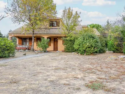 a house with a large yard in front of it at Holiday Home La Maison d'Antoine by Interhome in Salles-d'Aude