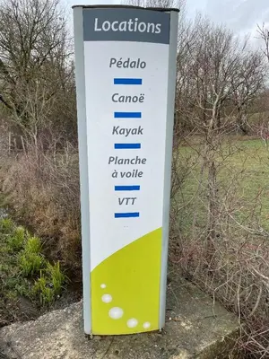 a sign on the side of a road at Gîte-appart privé du Domaine Spa piscine sauna in Lescout