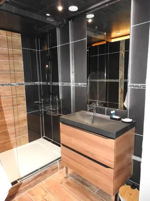 a bathroom with a sink and a shower at Love room 