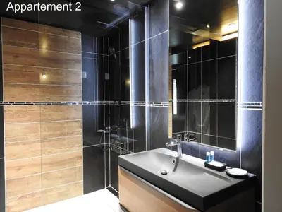 a bathroom with a sink and a shower at Love room 