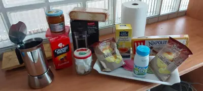 a counter with some food and other items on it at T2 tout confort, parking gratuit, vue lac et nature in Revel