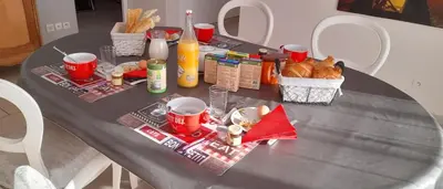 a table with food and drinks on top of it at Chez Carole et Michel en Minervois in Rieux-Minervois