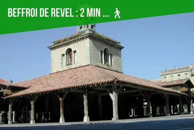 a building with a clock tower on top of it at LOFT DU GET in Revel