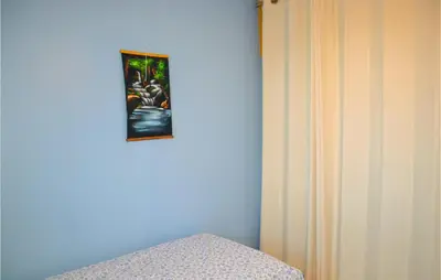 a corner of a room with a picture on the wall at Stunning Home In Saint-Nazaire-D'aude in Saint-Nazaire-dʼAude