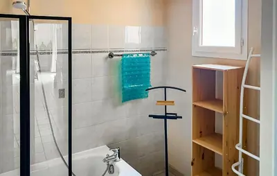 a bathroom with a shower and a tub and a sink at Stunning Home In Saint-Nazaire-D'aude in Saint-Nazaire-dʼAude