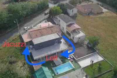 an aerial view of a house with a blue arrow at Koh Samui Siam Manahakhon Appart & Spa in Rieux-de-Pelleport