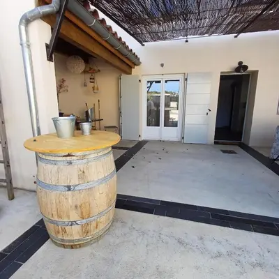 a barrel sitting in the middle of a garage at Gite des Platanes in Belvèze-du-Razès