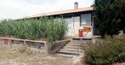 a small house with stairs in front of it at Mobilhome Côté mer - 3 Chambres - Climatisé - TV in Sigean