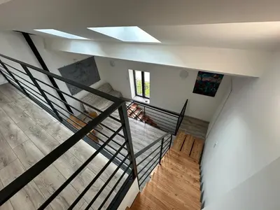 an overhead view of a staircase in a house at Gîte La Glycine in Dun