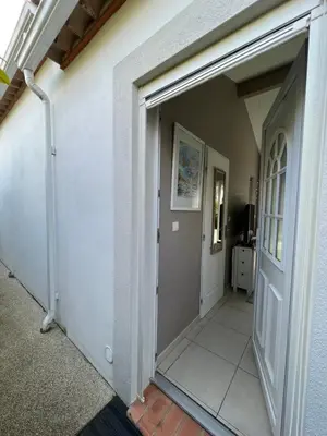 a door leading into a room with a hallway at Studio RIQUET indépendant attenant à Villa in Capestang