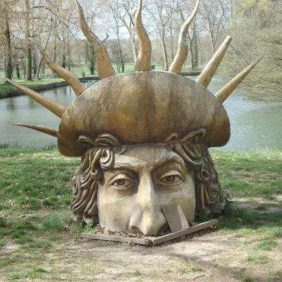 a statue of a head with antlers on it at L'oustal des Fontanilles in Castelnaudary