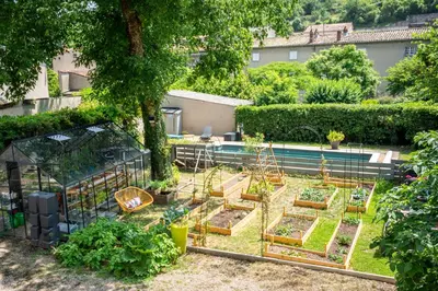 a garden with a bunch of plants in it at La Grande Maison Mazamet in Mazamet