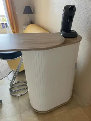a desk with a coffee maker on top of it at Appartement GRUISSAN Plage du Grazel in Gruissan