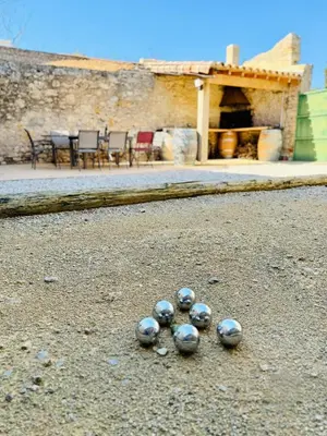a group of balls sitting on the ground at L'Oustal de Papet in Ferrals-lès-Corbières