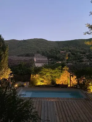 a view of a pool from the roof of a building at MAISON ST LAURENT in Olargues