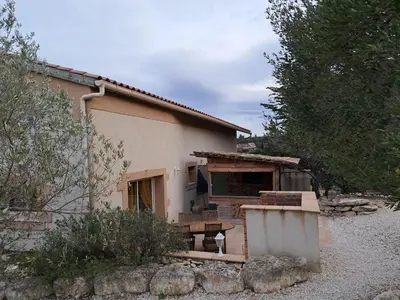 a house with a stove in front of it at Les Plages Haute in Peyriac-de-Mer