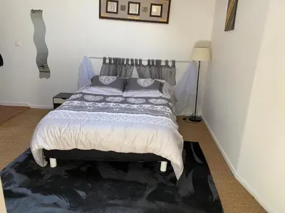 a bedroom with a bed in a room at Les Plages Haute in Peyriac-de-Mer