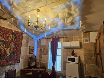 a room with a ceiling with blue lights on it at HARRY POTTER - Escape Game - Expérience Magique in Carcassonne